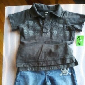 Skull polo and jeans... So cute.